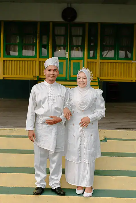 Kartika Sari dan Heri Simon